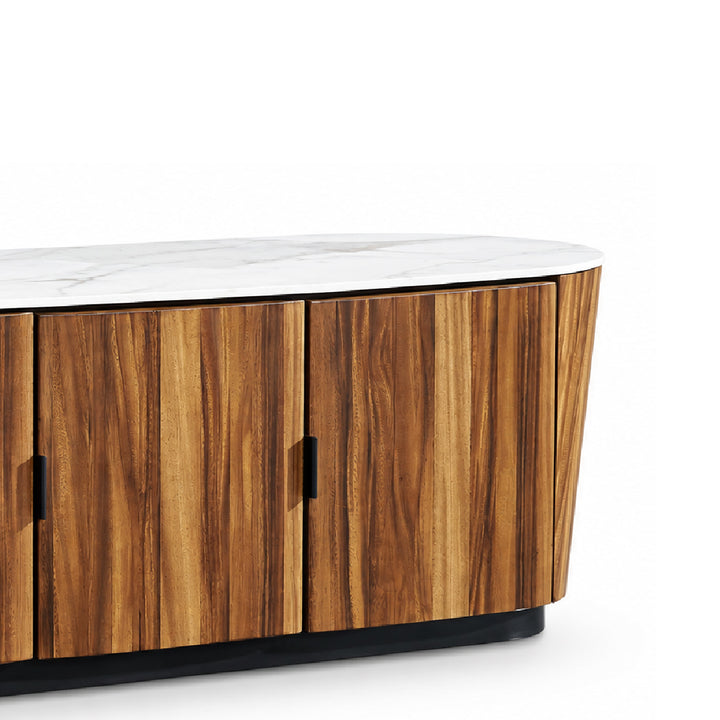 Close-up of a modern curved tv cabinet with vertical wood grain doors, a white marble-look top, and black handles on a clean white background.