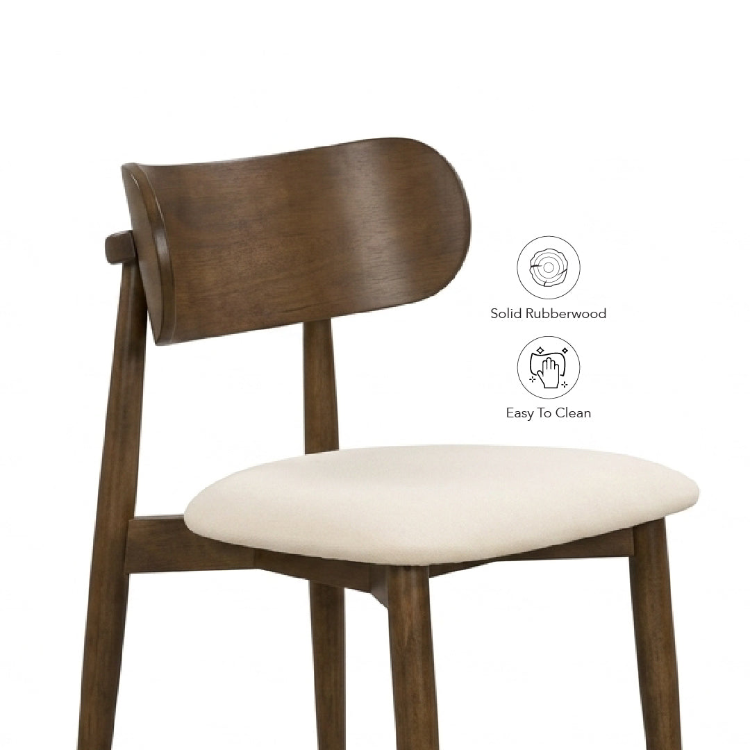 A mid-century modern wooden dining chair with a curved backrest, dark brown rubberwood frame, and a cream-colored upholstered seat cushion. Two circular icons on the right highlight its features: 'Solid Rubberwood' and 'Easy To Clean'.