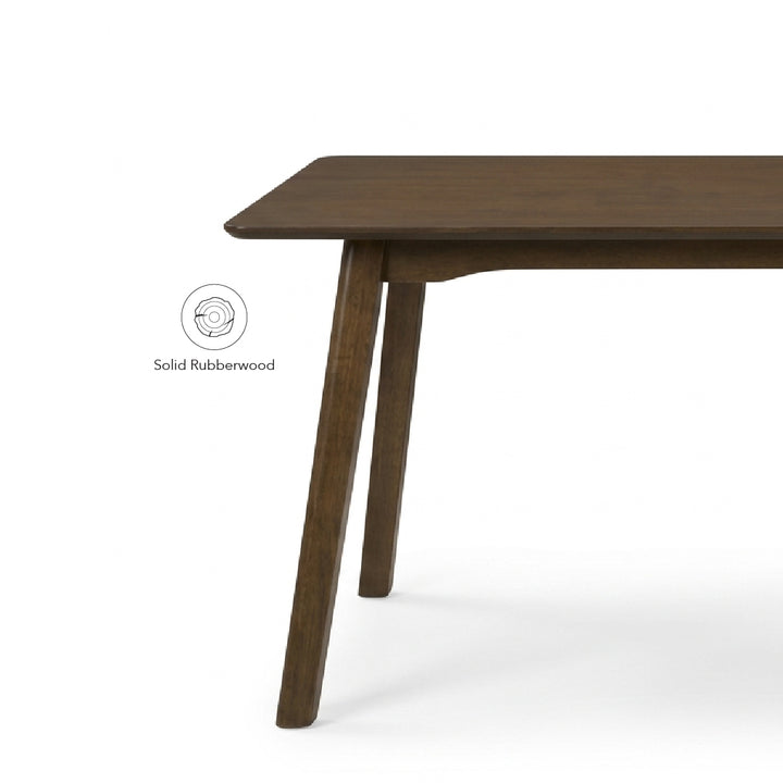 A close-up of a dark brown wooden table corner with angled legs, featuring a 'Solid Rubberwood' label on a clean white background.