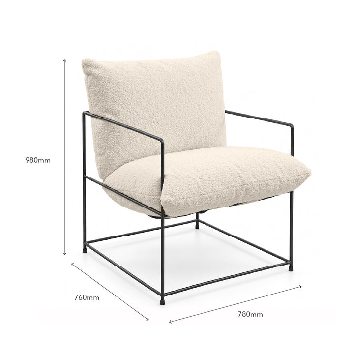 A modern armchair with textured cream bouclé cushions and a black metal frame, shown with dimension lines and labels indicating height of 980mm, width of 760mm, and depth of 780mm on a white background.
