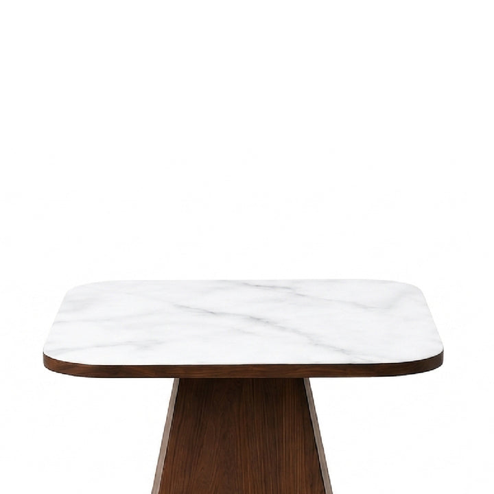 A modern square side table featuring a white marble top with subtle gray veining and a dark brown wooden pedestal base, shown against a solid white background.