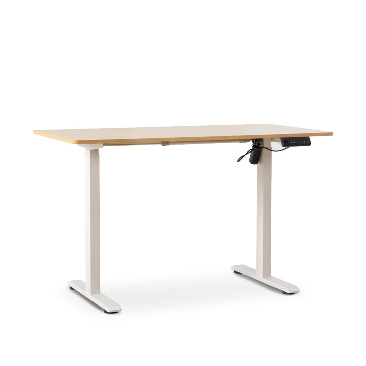 An adjustable height standing desk with a light wood grain top and white metal legs, shown from a three-quarters angle on a white background.