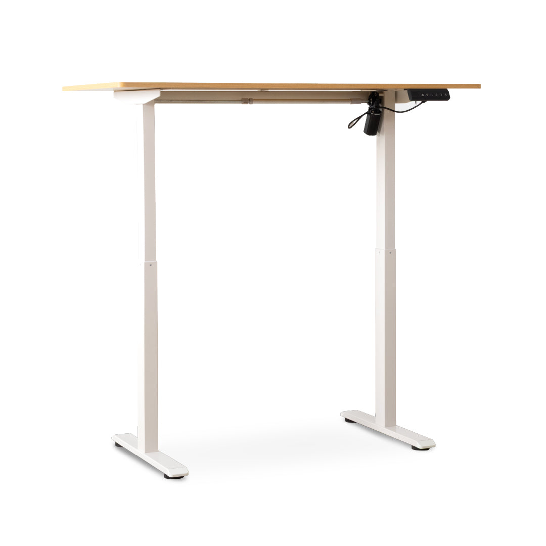 An adjustable standing desk with a light natural wood top and white metal legs, shown on a clean white background with a control panel under the right side of the desk.