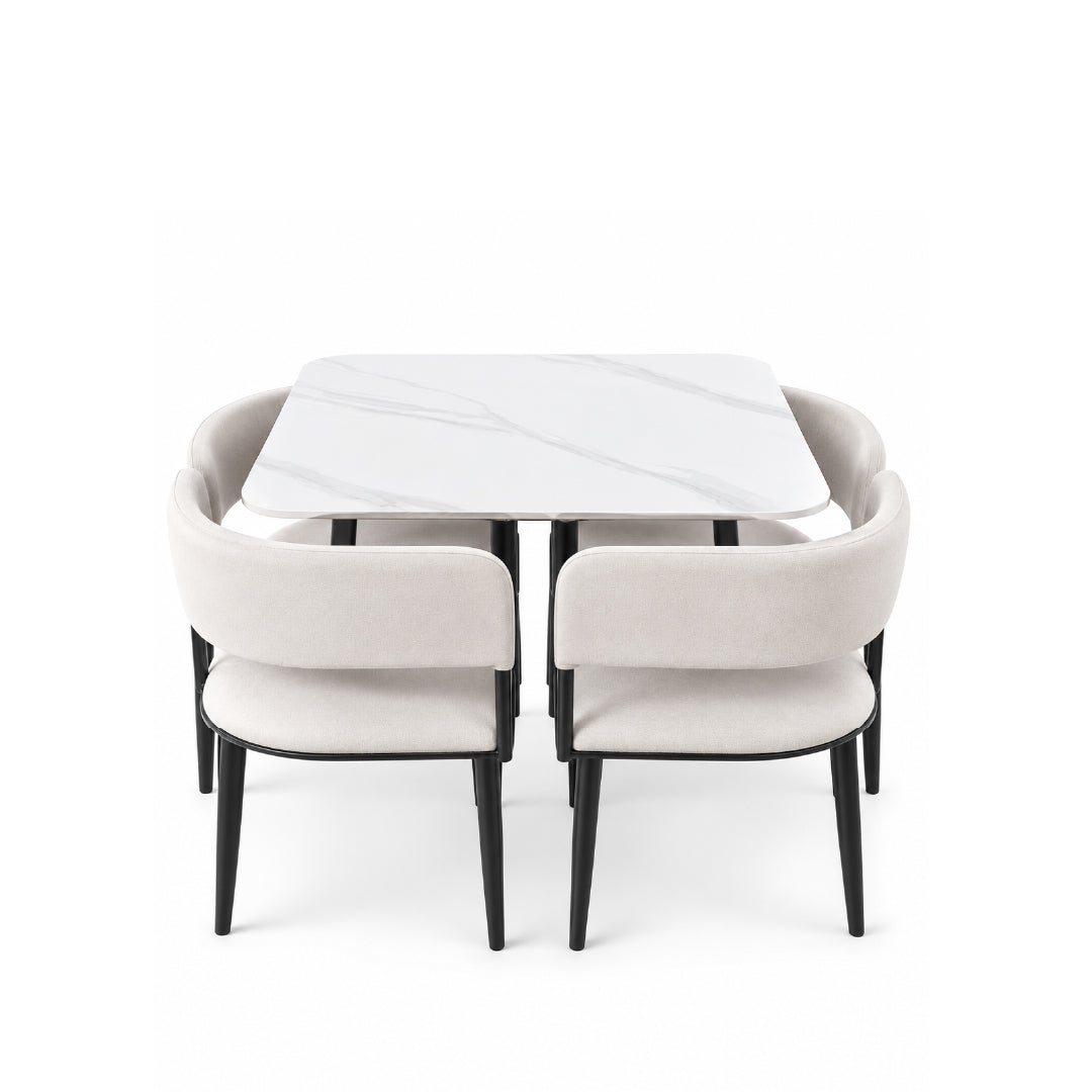 A modern dining set featuring a square white marble table with rounded corners and four upholstered armchairs in a light beige fabric with black legs, shown on a solid white background.