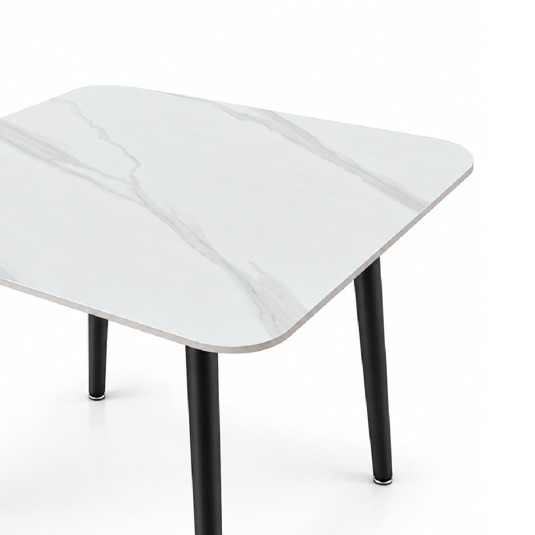 A modern square table with rounded corners, featuring a white marble-patterned top and slim black legs, shown on a clean white background.