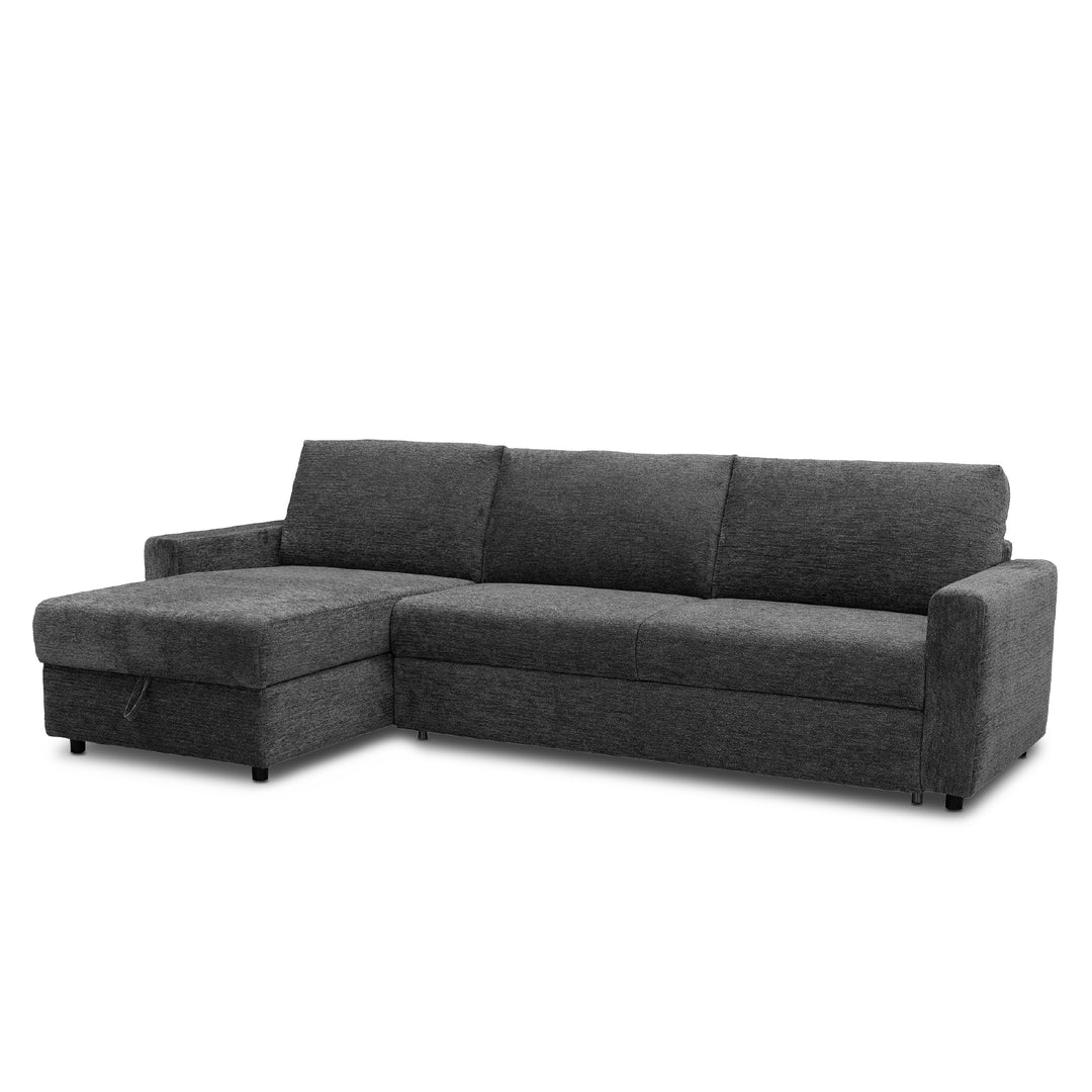 A dark gray fabric sectional sofa-bed with a left-facing chaise lounge, shown from a three-quarter angle against a plain white background.