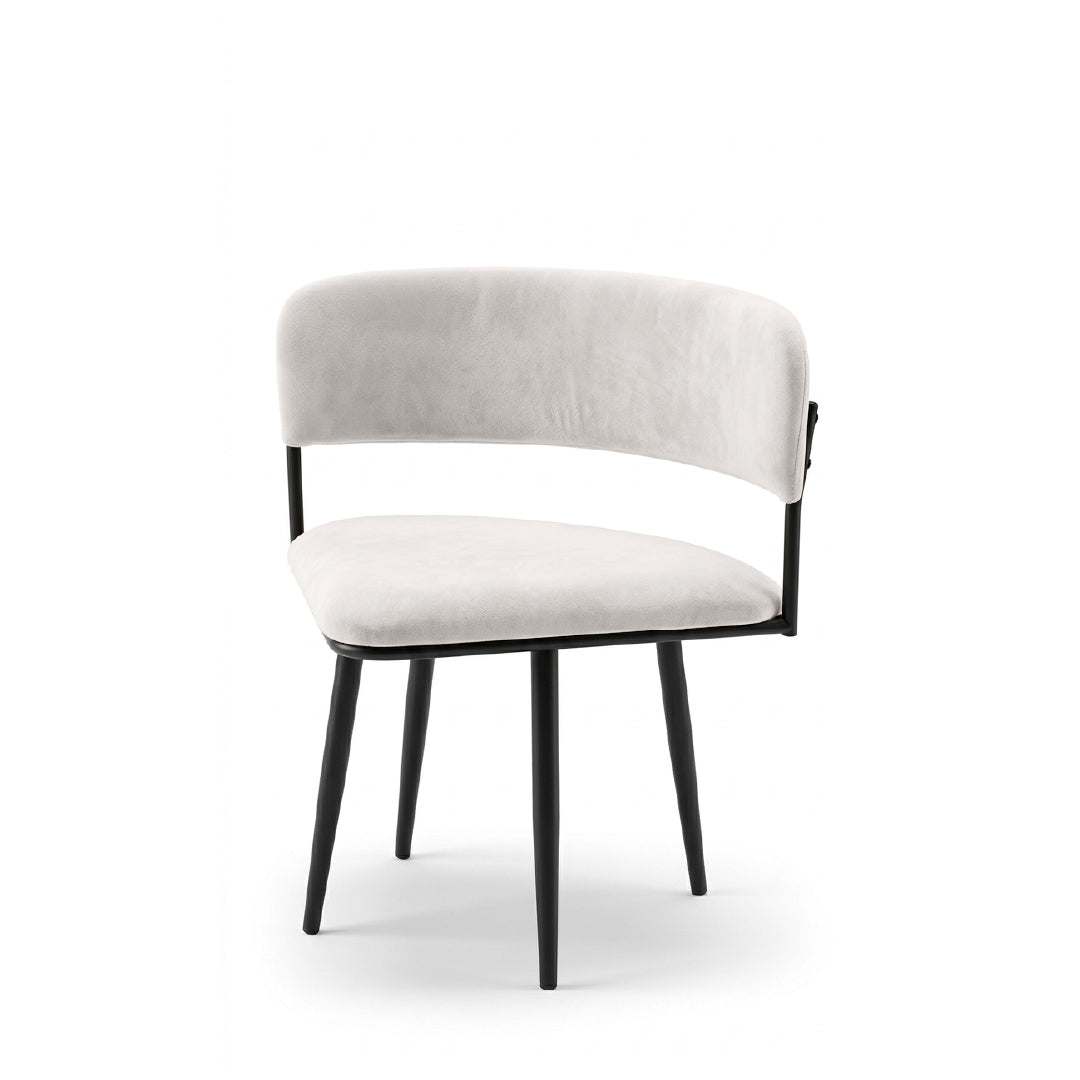 A modern dining chair with a curved light beige upholstered backrest and seat, supported by a black metal frame and tapered black legs, shown against a plain white background.