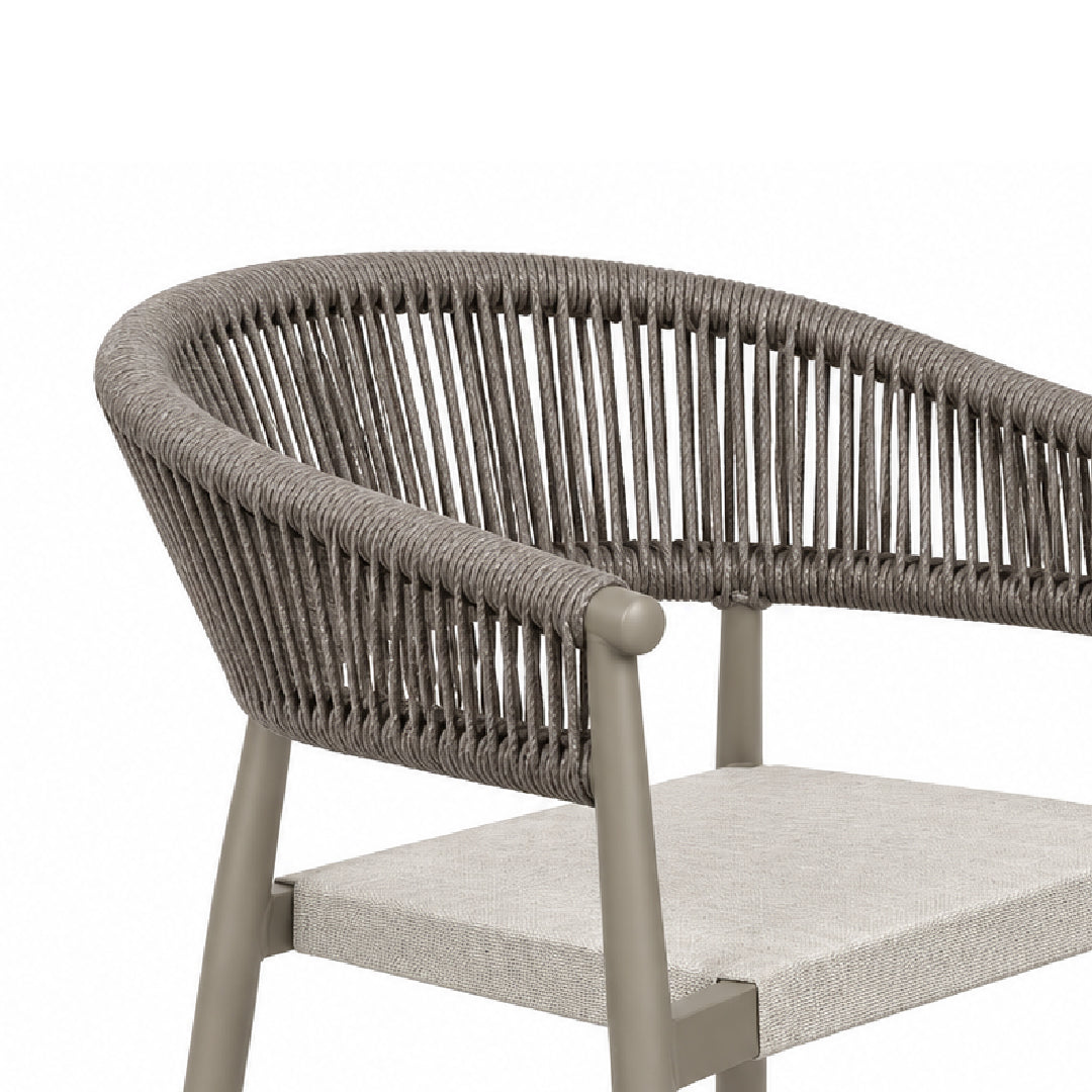 Close-up of a modern outdoor chair with a curved gray rope-wrapped backrest and a light beige seat cushion on a taupe metal frame, set against a plain white background.
