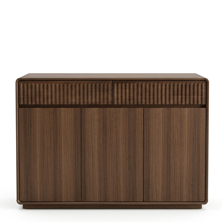 A modern wooden sideboard cabinet with a dark brown walnut finish, featuring a ribbed top drawer section and three lower cabinet doors, shown against a plain white background.