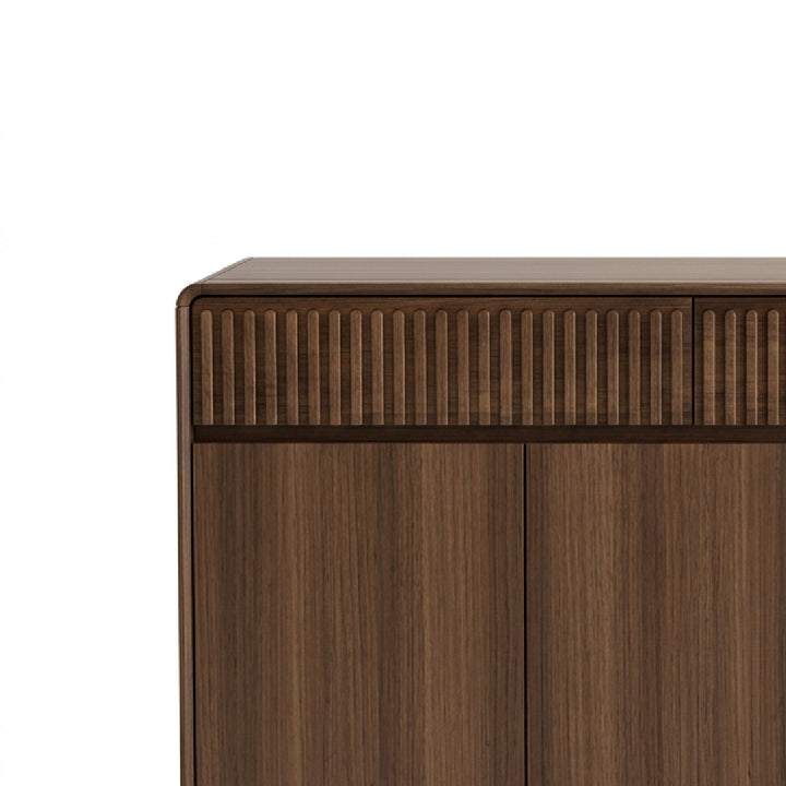 Close-up of a dark brown wooden cabinet or sideboard with a ribbed front panel and wood grain texture, shown against a plain white background.