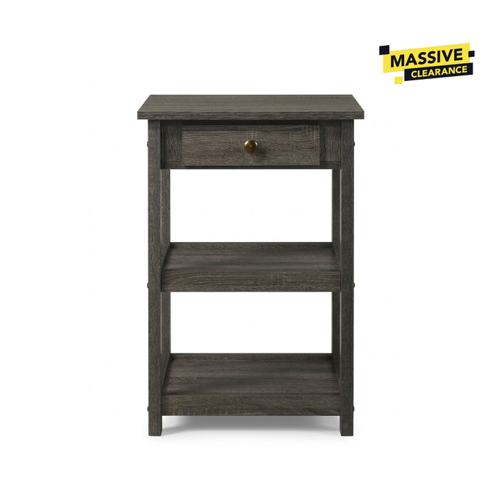 A dark gray wood three-tier side table with a single drawer and a round brass knob, shown on a white background with a 'MASSIVE CLEARANCE' badge in the top right corner.