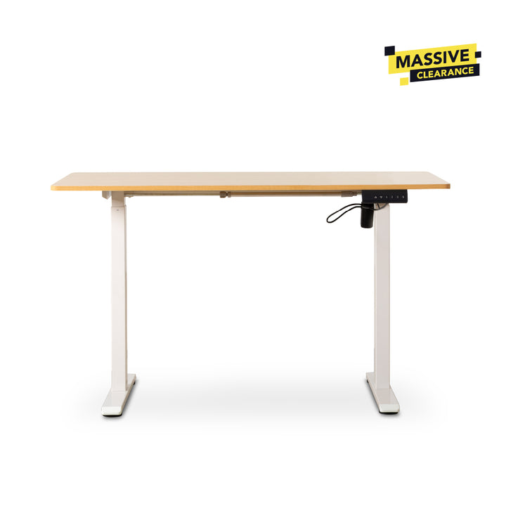 An adjustable height standing desk with a light wood grain top and white metal legs, shown on a white background.